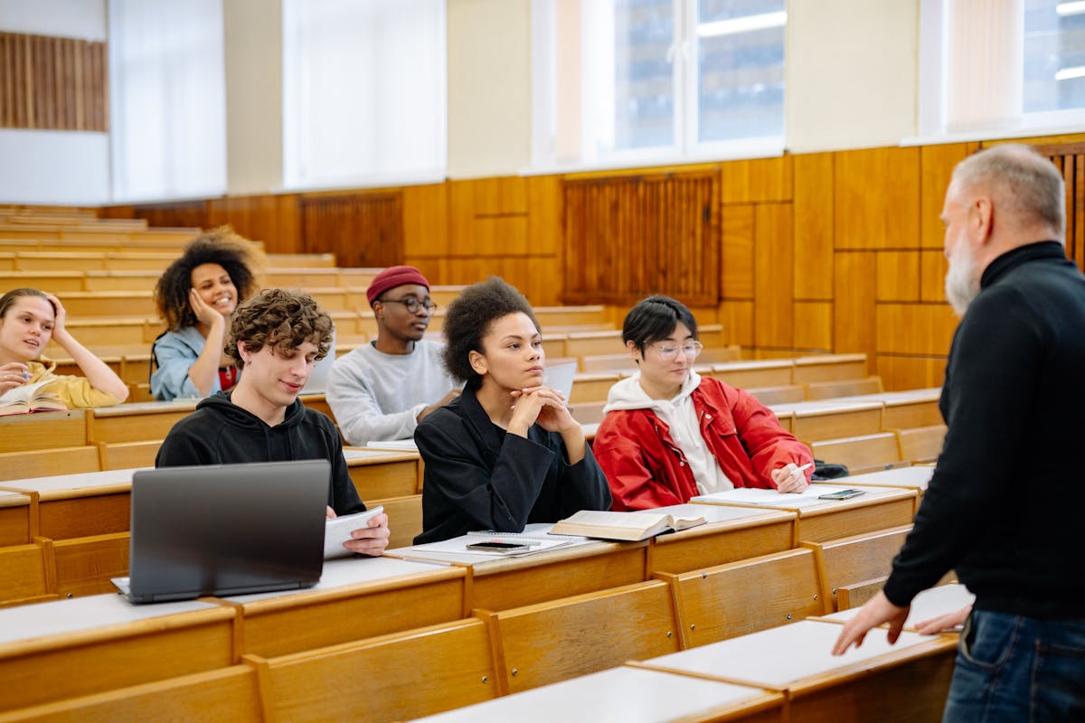 students and tutor at classroom